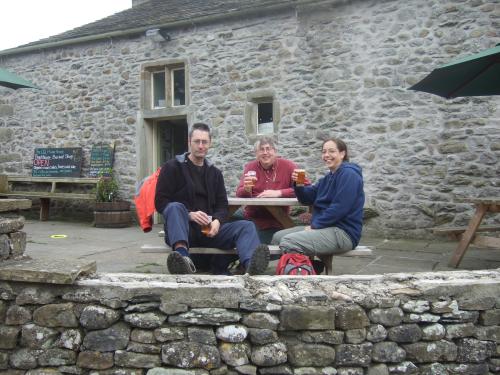 Photo shows three intrepid hikers outside the Old Manor House (Clapham)