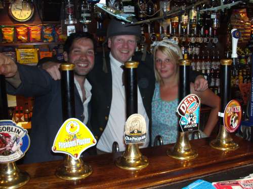 New tenant Owen Edge (centre) with bar staff